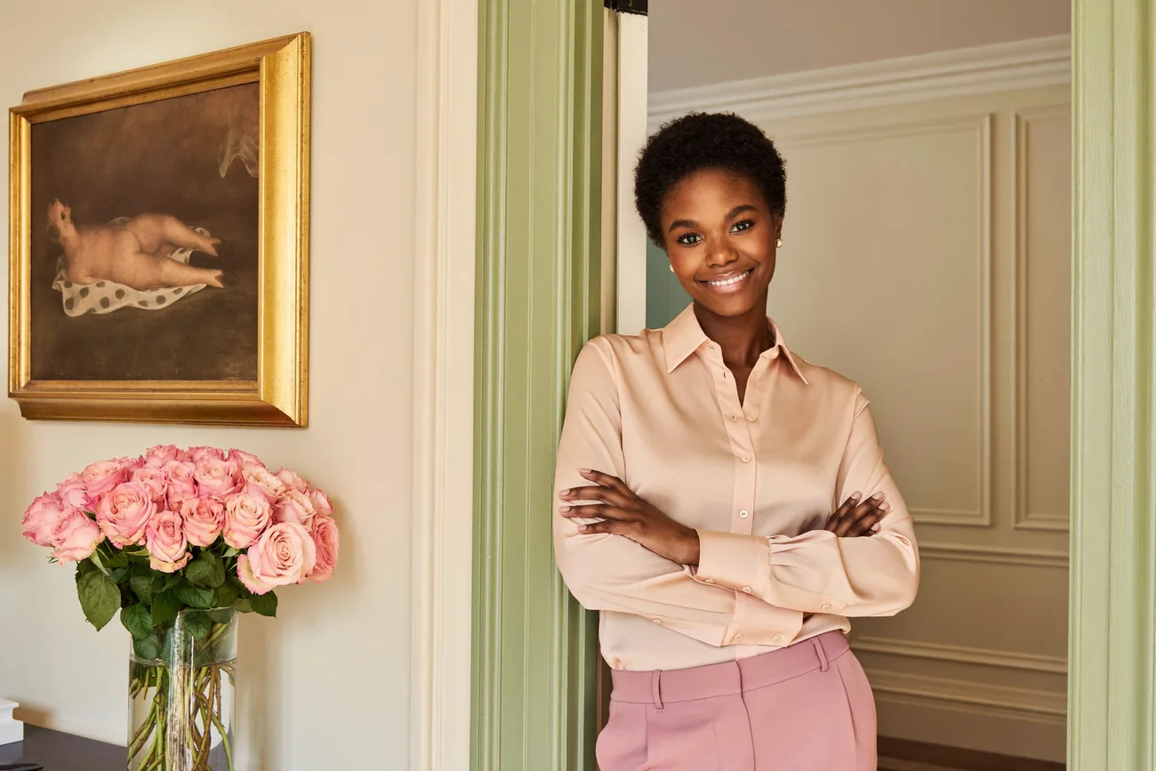 The owner of Pink Planett in the hallway of a London home