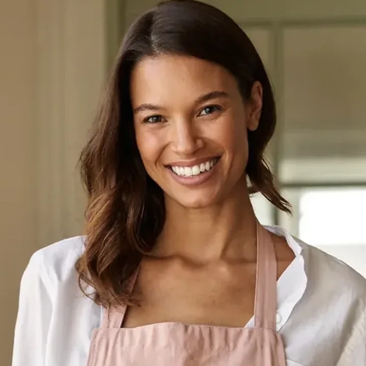 A Pink Planett housekeeper ready to take your enquiry