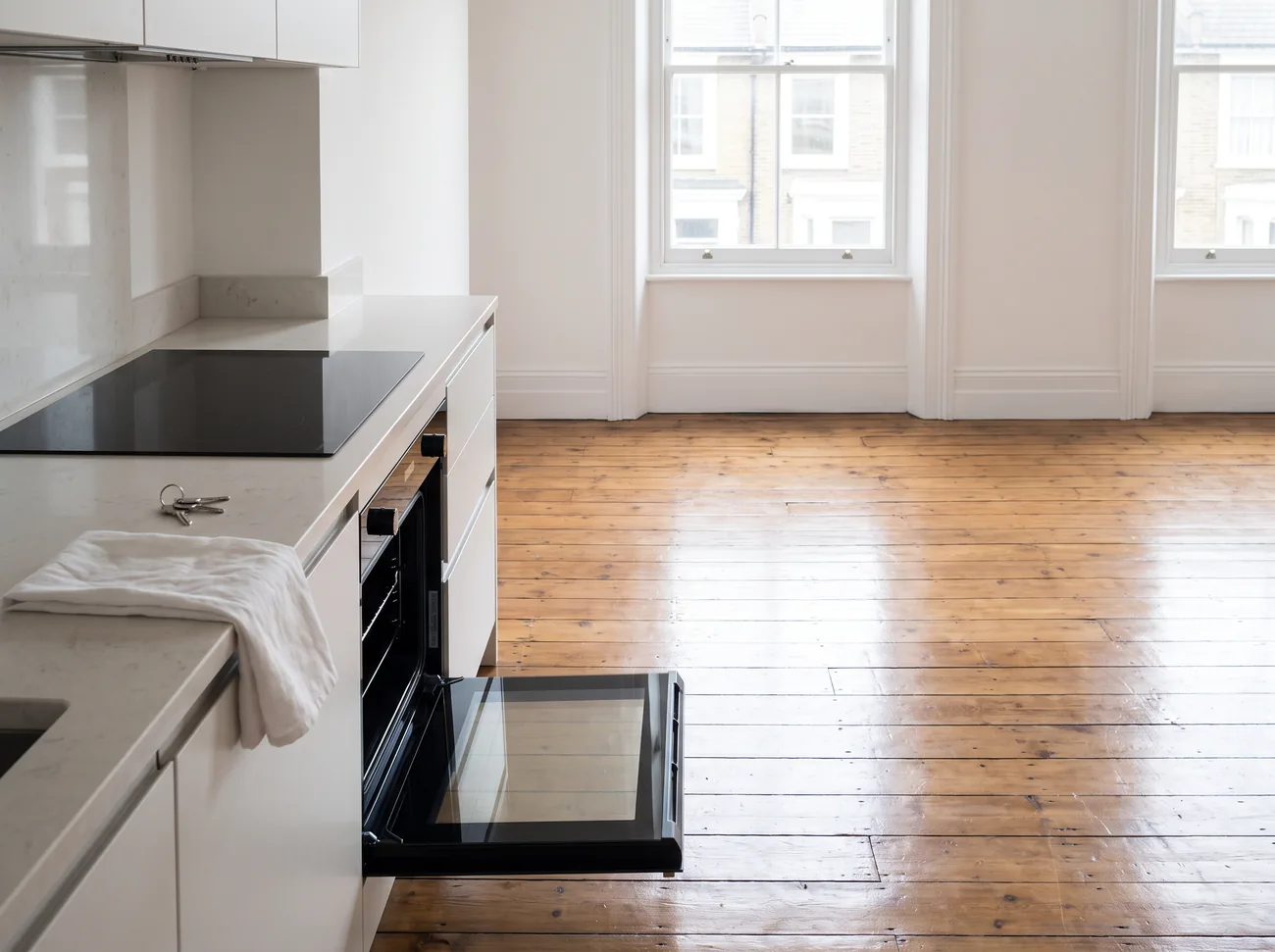 An empty London flat cleaned to inventory standard, keys on the worktop